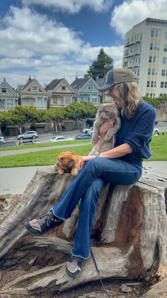 Dr. Azure Holland and her cats Pecan Pie and Lady Blue enjoying the outdoors in SF